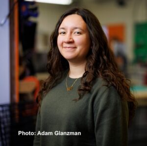 Closeup shot of Kik Hayano in front of a lab